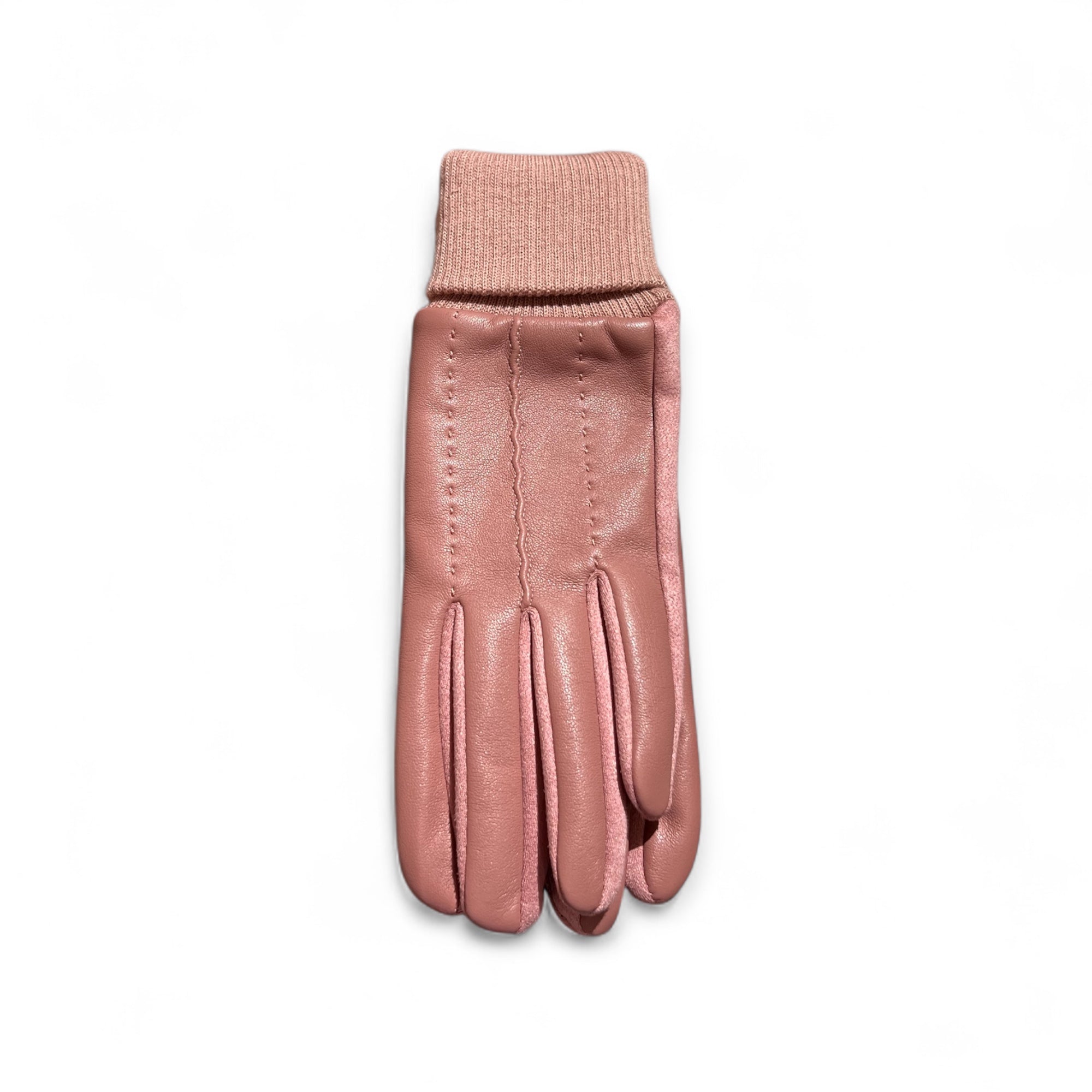 Damenhandschuhe aus Kunstleder in Rosa mit weichen Strick, auf weißen Hintergrund fotografiert.