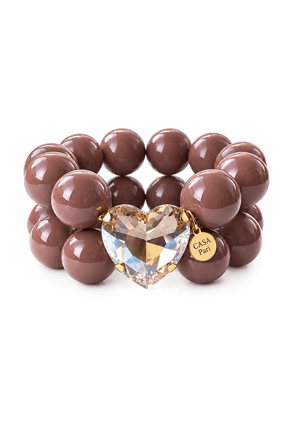 Taube farbendes Doppel reihiges Armband mit einem Kristallherz auf weißem Hintergrund fotografiert