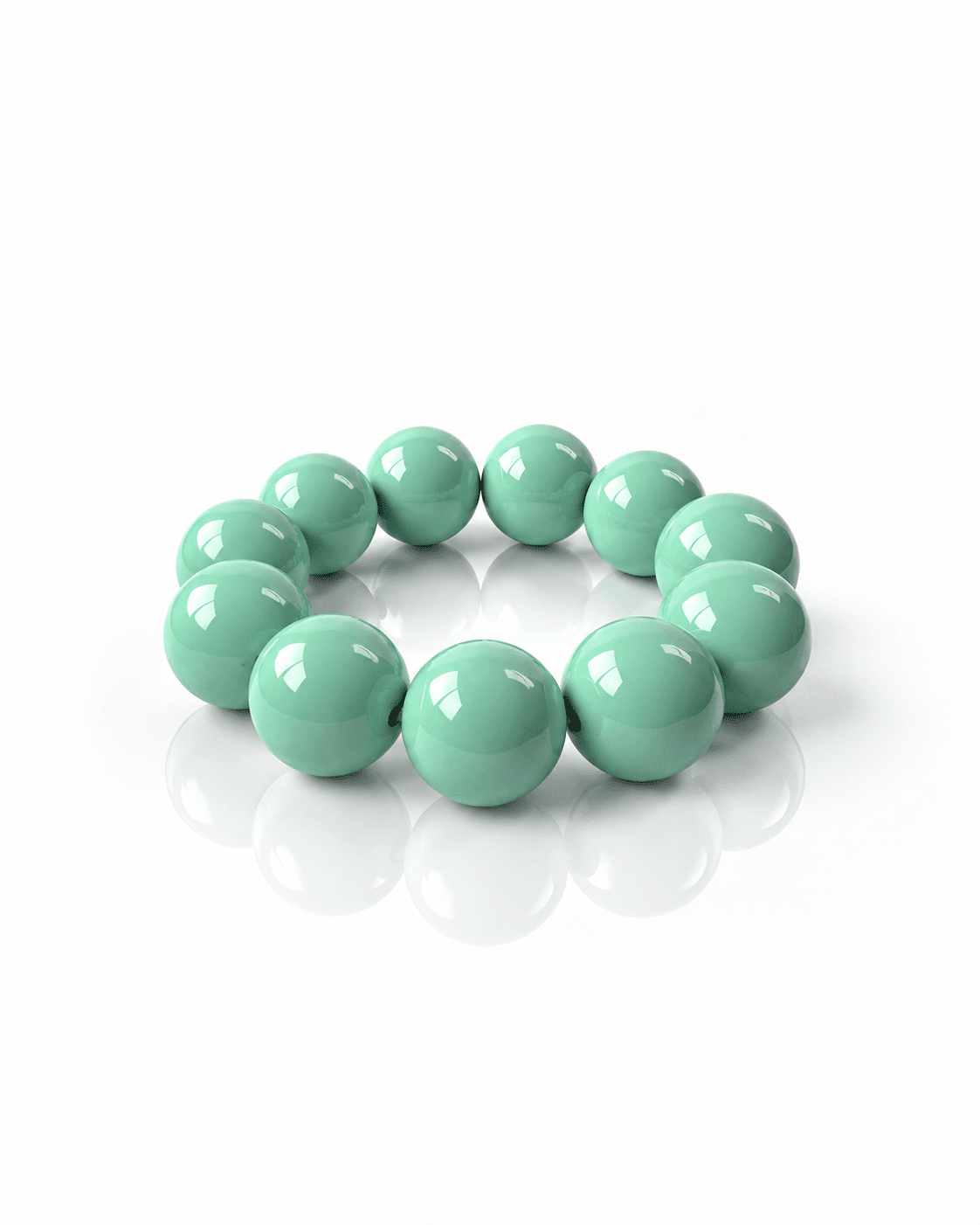 Armband aus großen glänzenden mintgrünen Resin-Perlen auf weißem Hintergrund